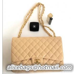 Sumptuous Chanel Maxi Classic Flap Bag A58601 in Caviar Leather Apricot/Gold