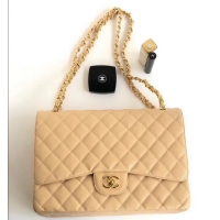 Sumptuous Chanel Maxi Classic Flap Bag A58601 in Caviar Leather Apricot/Gold