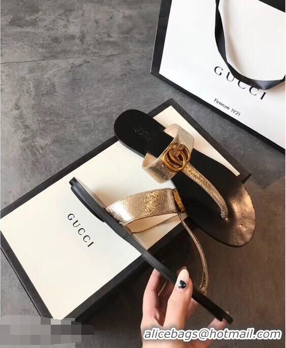 Big Enough Gucci Leather Thong Sandals with Double G 497444 Metallic Gold