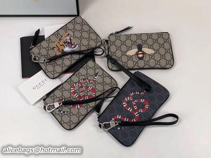 Durable Gucci Bee print GG Supreme pouch 522866