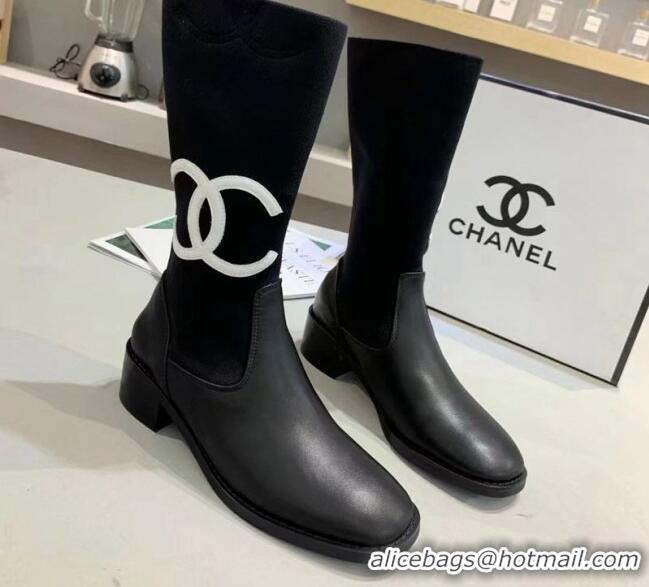 Luxurious Chanel Calfskin and Knit Fabric CC Flat Fold Short Boots Black/White 2019 (DLY-9101926 )