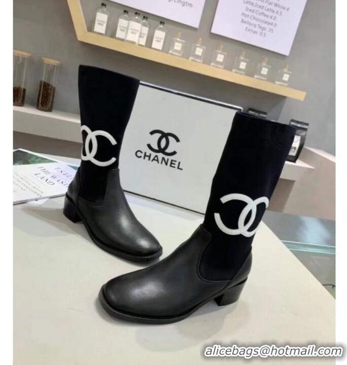 Luxurious Chanel Calfskin and Knit Fabric CC Flat Fold Short Boots Black/White 2019 (DLY-9101926 )