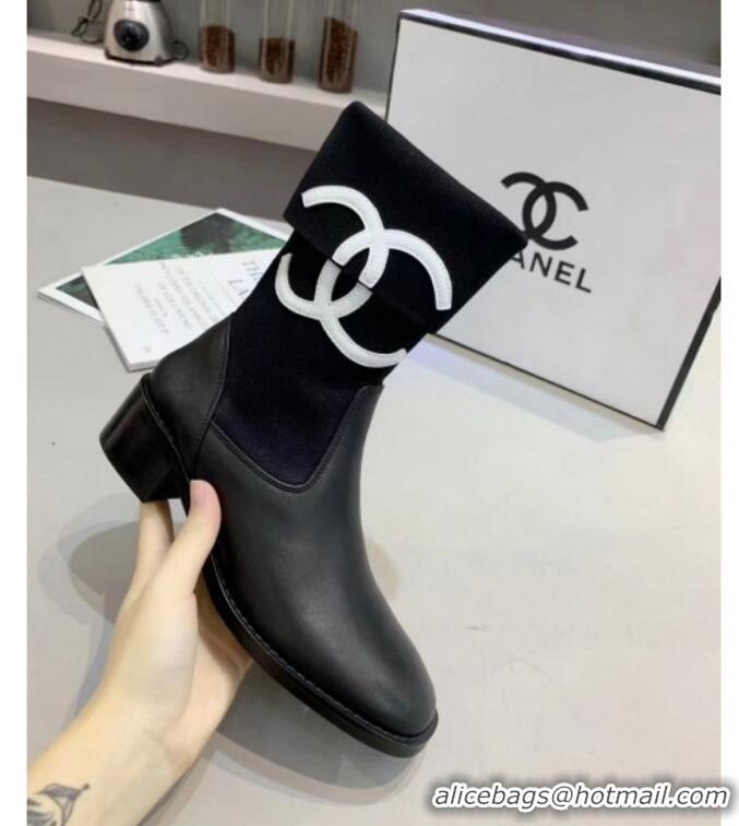 Luxurious Chanel Calfskin and Knit Fabric CC Flat Fold Short Boots Black/White 2019 (DLY-9101926 )