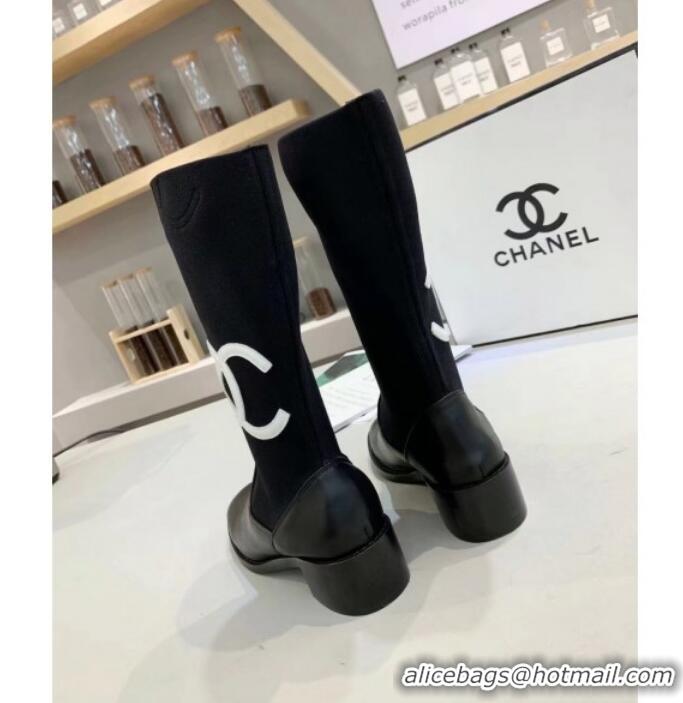 Luxurious Chanel Calfskin and Knit Fabric CC Flat Fold Short Boots Black/White 2019 (DLY-9101926 )