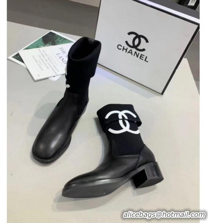 Luxurious Chanel Calfskin and Knit Fabric CC Flat Fold Short Boots Black/White 2019 (DLY-9101926 )