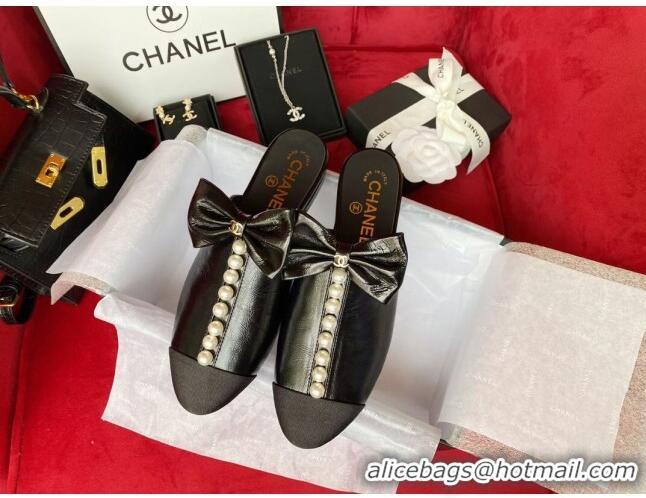 Charming Chanel Wax Calfskin Flat Mules with Pearl and Bow Black 331101