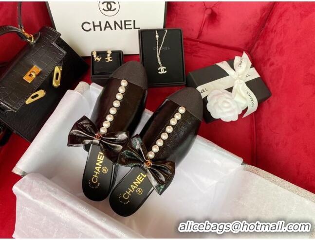 Charming Chanel Wax Calfskin Flat Mules with Pearl and Bow Black 331101