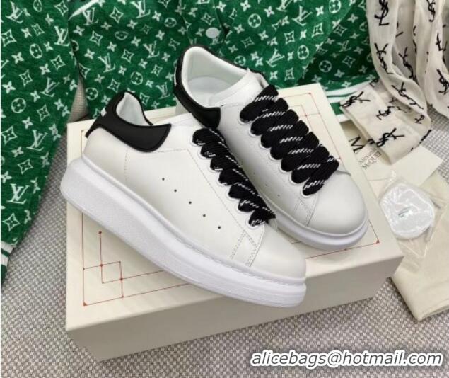 Stylish Alexander McQueen Oversized Sneakers in White Silky Calfskin with Contrasting Back Black 072348