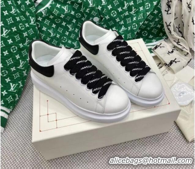 Stylish Alexander McQueen Oversized Sneakers in White Silky Calfskin with Contrasting Back Black 072348