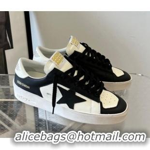 Luxurious Golden Goose Women’s Stardan sneakers with Black suede star in leather White 704027