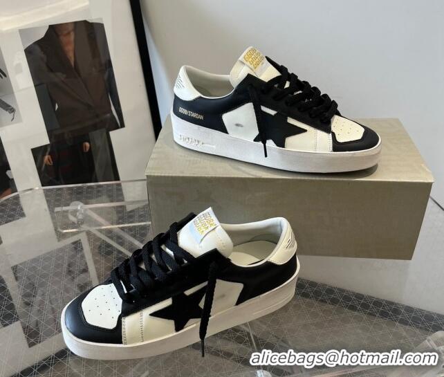 Luxurious Golden Goose Women’s Stardan sneakers with Black suede star in leather White 704027