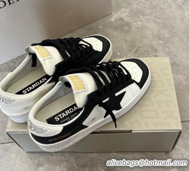 Luxurious Golden Goose Women’s Stardan sneakers with Black suede star in leather White 704027