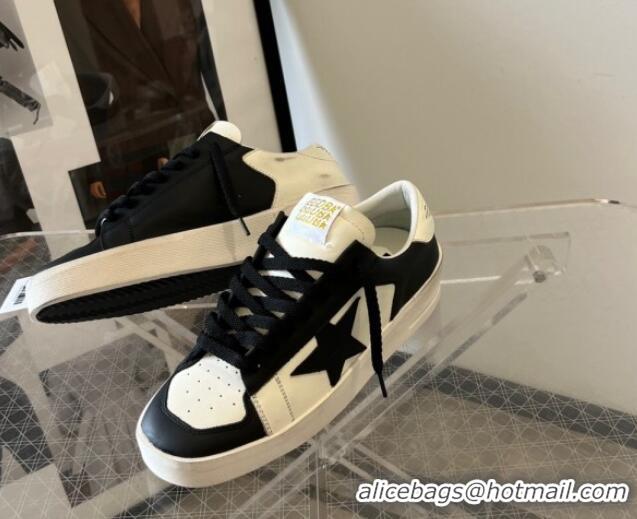 Luxurious Golden Goose Women’s Stardan sneakers with Black suede star in leather White 704027