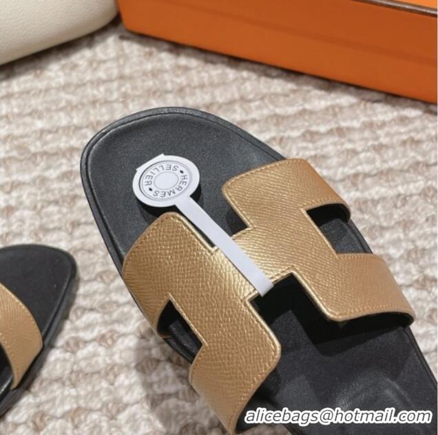 Luxurious Hermes Classic Oran Flat Slide Sandals in Palm Grained Leather Gold/Black 123055