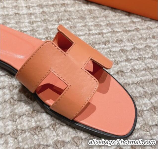 Shop Duplicate Hermes Classic Oran Flat Slide Sandals in Smooth Leather Coral Pink 0123079