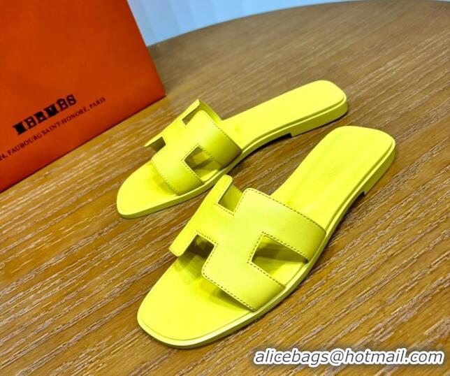 Luxurious Hermes Oran Classic Swift Calfskin Flat Slide Sandals Yellow 62605