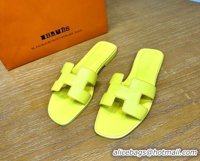 Luxurious Hermes Oran Classic Swift Calfskin Flat Slide Sandals Yellow 62605