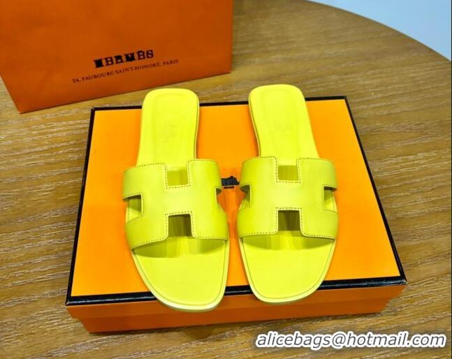 Luxurious Hermes Oran Classic Swift Calfskin Flat Slide Sandals Yellow 62605