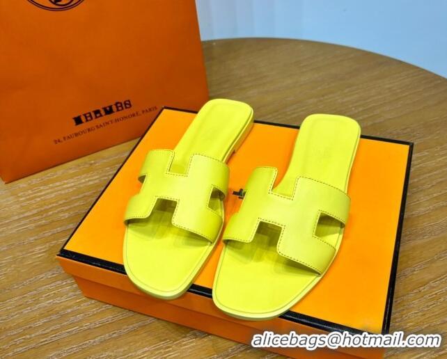 Luxurious Hermes Oran Classic Swift Calfskin Flat Slide Sandals Yellow 62605