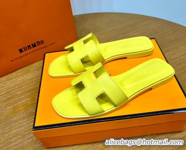 Luxurious Hermes Oran Classic Swift Calfskin Flat Slide Sandals Yellow 62605