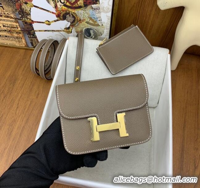 Grade Hermes Constance Slim Wallet with Leather Strap in Epsom Leather H0112 Etoupe/Gold 2024 (Half Handmade)