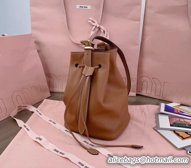 Shop Best Miu Miu Leather bucket bag 5BE090 Brown 2024