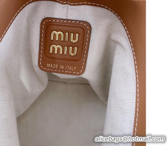 Shop Best Miu Miu Leather bucket bag 5BE090 Brown 2024