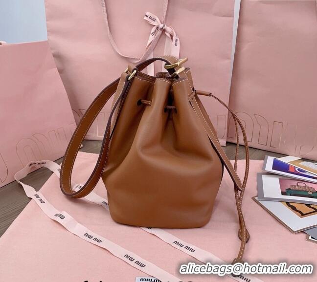 Shop Best Miu Miu Leather bucket bag 5BE090 Brown 2024