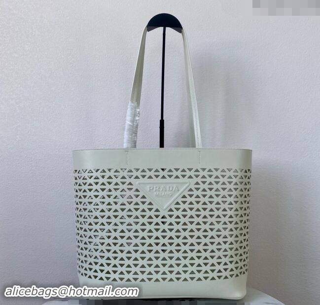 Shop Grade Prada Large perforated leather tote bag 1BG503 White 2024