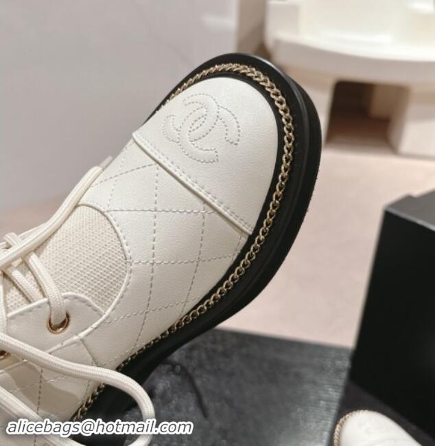 Luxurious Chanel Quilted Calfskin & Knit Lace-up Ankle Boots with Logo Stud White Upper 909052