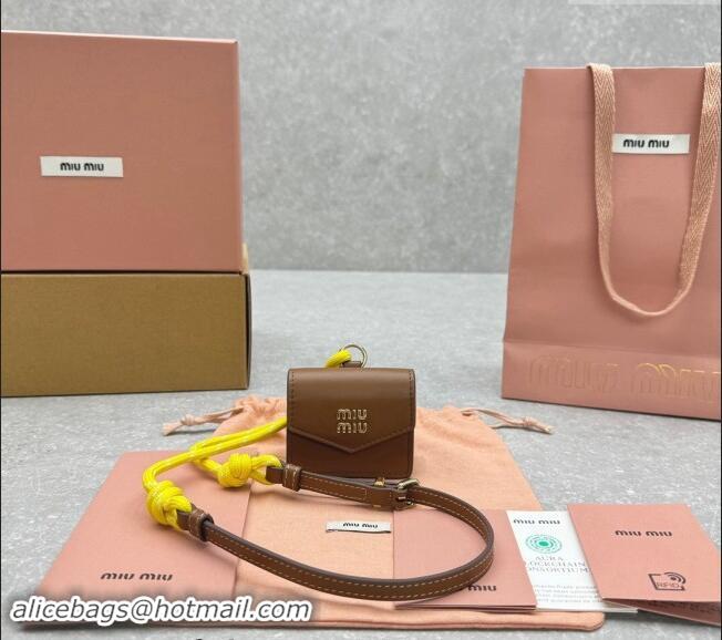 Good Taste Miu Miu Leather, cord, and metal trick with mini-pouch 5TL515 Yellow/Brown 2024