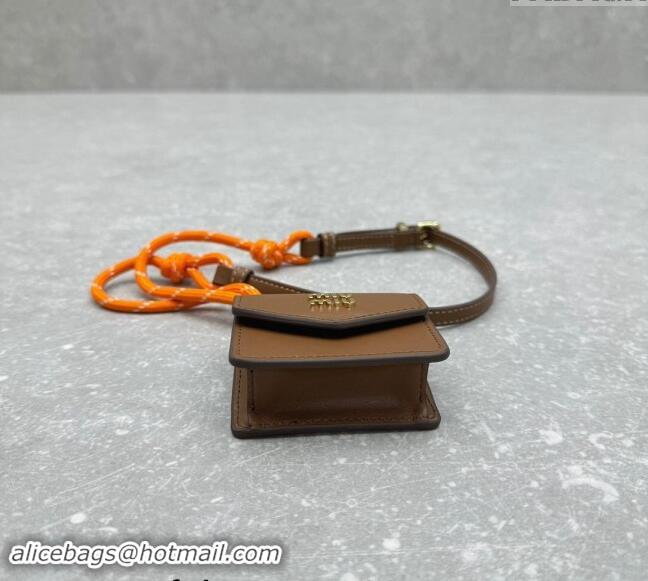 Top Design Miu Miu Leather, cord, and metal trick with mini-pouch 5TL515 Orange/Brown 2024