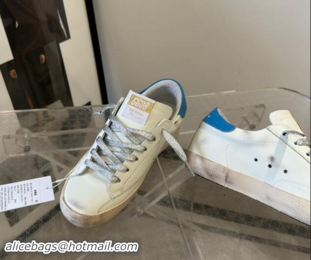 Luxury Golden Goose Super-Star Sneakers in White Leather with Silver Glitter Star and Blue Tab 530016