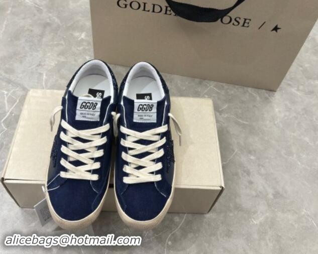 Stylish Golden Goose Women's Super-Star in navy blue nappa with black star and glitter heel tab 702118