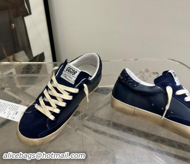 Stylish Golden Goose Women's Super-Star in navy blue nappa with black star and glitter heel tab 702118