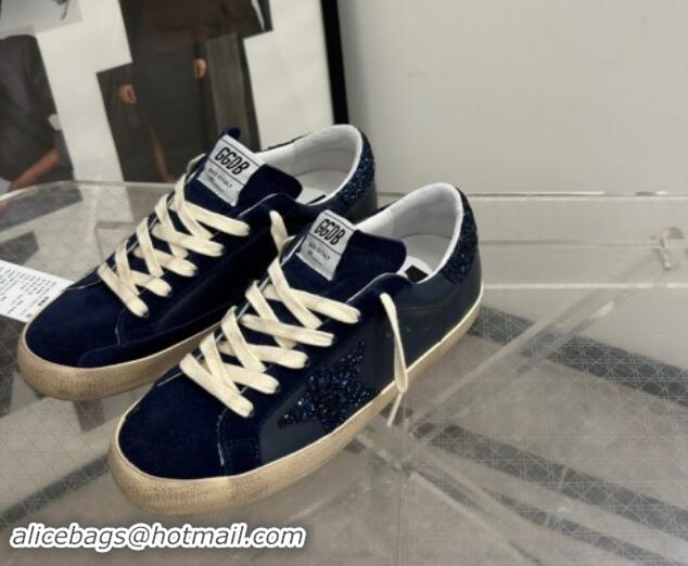 Stylish Golden Goose Women's Super-Star in navy blue nappa with black star and glitter heel tab 702118