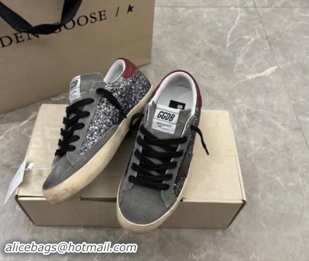 Grade Quality Golden Goose Super-Star Sneakers in silver glitter with black suede star and burgundy tab 905070