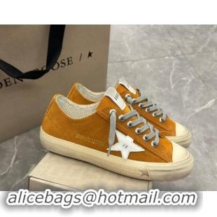 Stylish Golden Goose Women's V-Star sneakers in yellow suede with a white leather star 009067