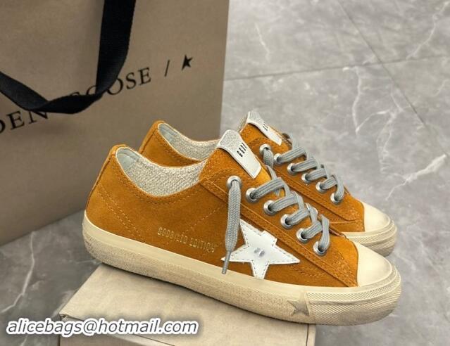 Stylish Golden Goose Women's V-Star sneakers in yellow suede with a white leather star 009067