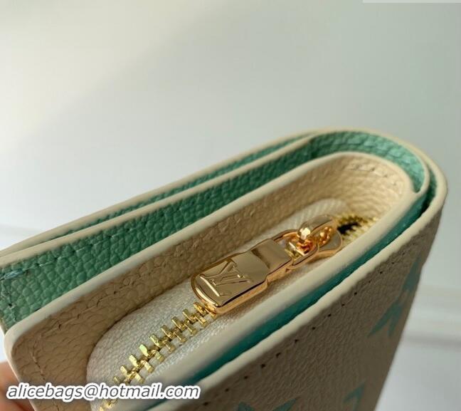 Pretty Style Louis Vuitton Clea Coin Purse Wallet in Bicolor Monogram Empreinte Leather M80151 Green 2024