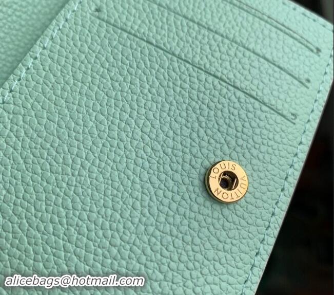 Pretty Style Louis Vuitton Clea Coin Purse Wallet in Bicolor Monogram Empreinte Leather M80151 Green 2024