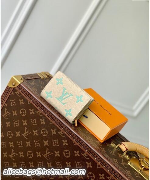 Pretty Style Louis Vuitton Clea Coin Purse Wallet in Bicolor Monogram Empreinte Leather M80151 Green 2024