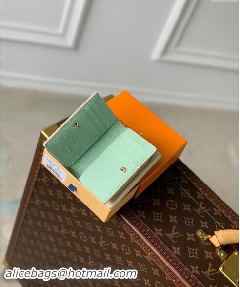 Pretty Style Louis Vuitton Clea Coin Purse Wallet in Bicolor Monogram Empreinte Leather M80151 Green 2024