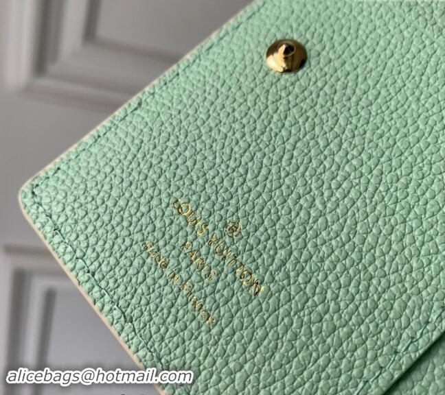 Pretty Style Louis Vuitton Clea Coin Purse Wallet in Bicolor Monogram Empreinte Leather M80151 Green 2024