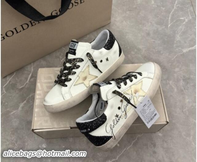 Best Product Golden Goose Super-Star Sneakers in white leather with black strass tab and gold star 1113003