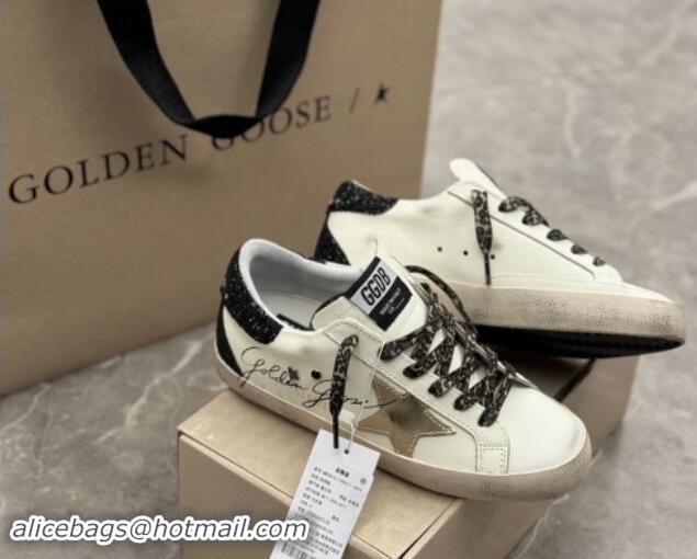 Best Product Golden Goose Super-Star Sneakers in white leather with black strass tab and gold star 1113003