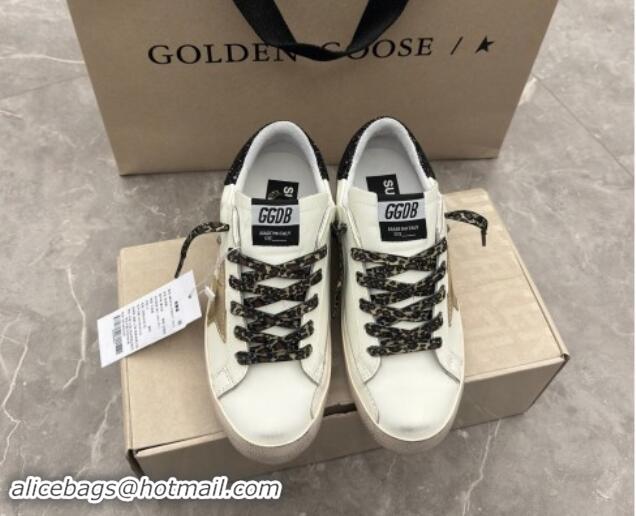 Best Product Golden Goose Super-Star Sneakers in white leather with black strass tab and gold star 1113003