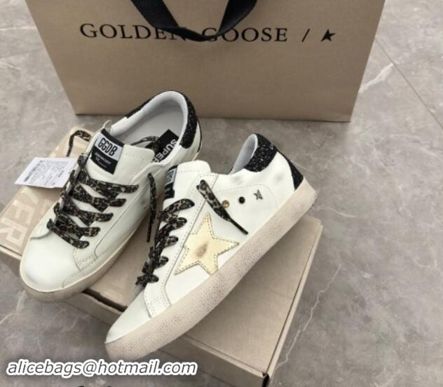 Best Product Golden Goose Super-Star Sneakers in white leather with black strass tab and gold star 1113003