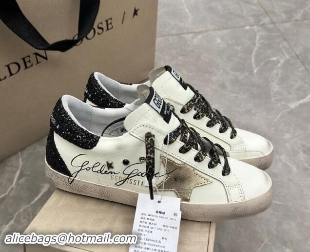 Best Product Golden Goose Super-Star Sneakers in white leather with black strass tab and gold star 1113003