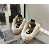 Good Looking Golden Goose Ball Star Sabots sneaker mules in white leather with silver glitter star and shearling lining 